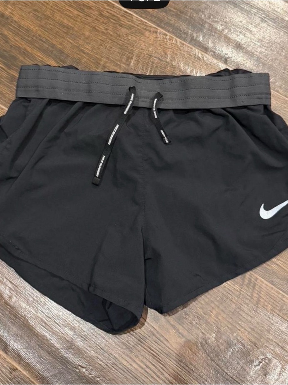 Nike Women's Black Athletic Shorts with Reflective Swoosh